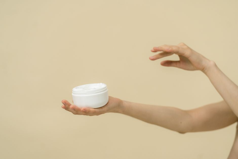 A face cream in an open jar